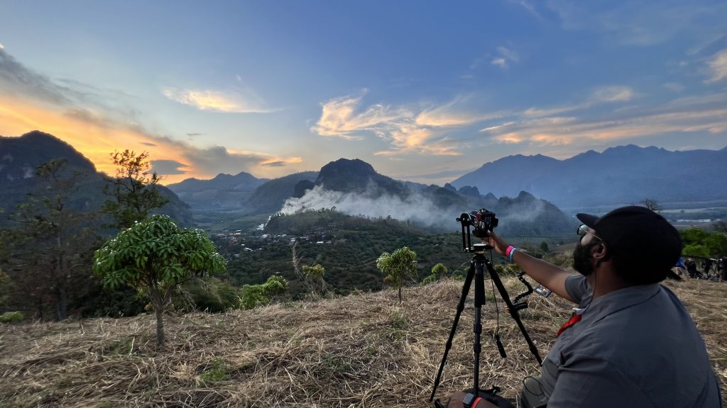 Andrew Roberts captures an image at sunset on location of The Creator.